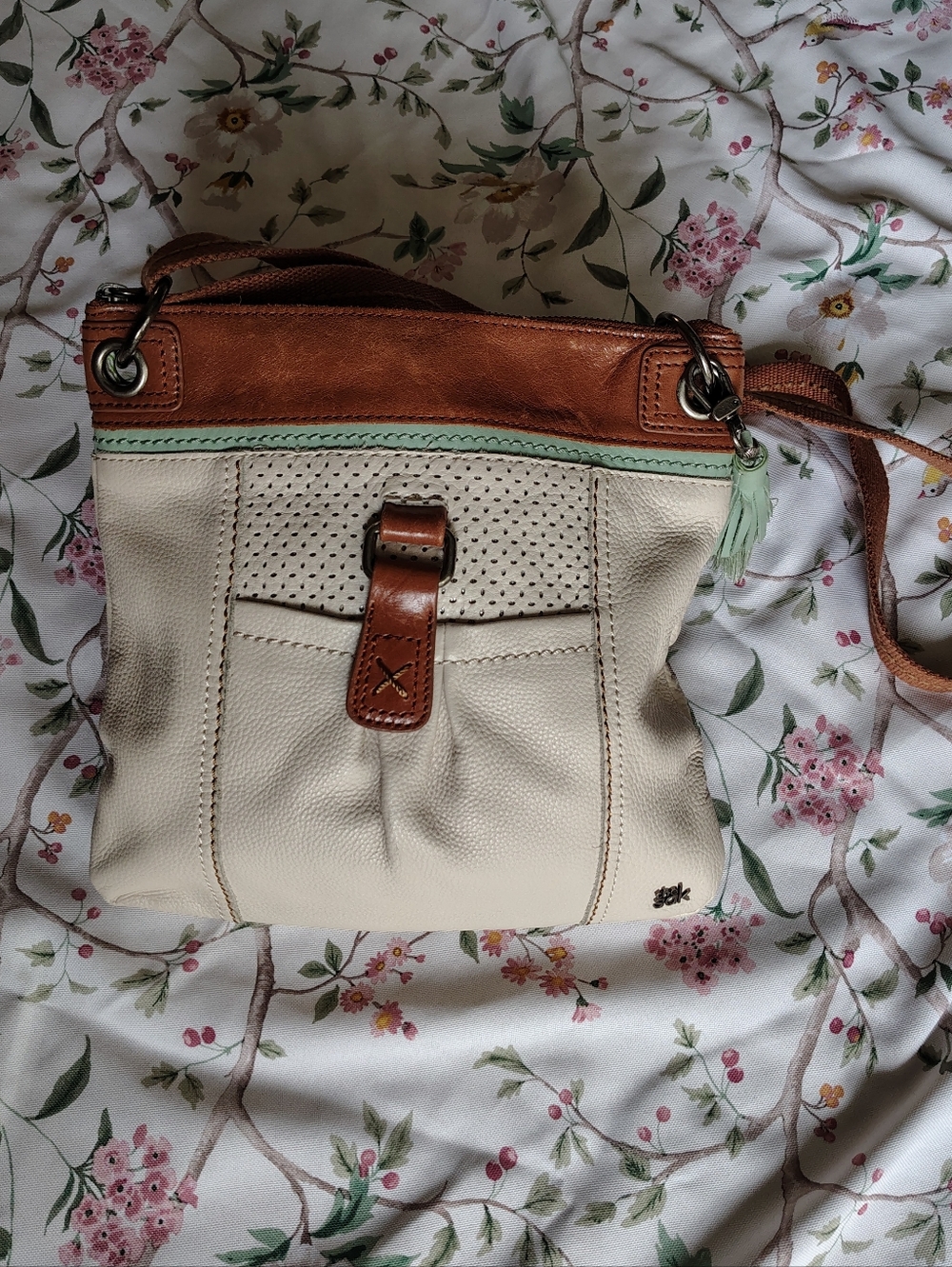 The Sak Cream Leather Crossbody with Brown Trim and Mint Accent